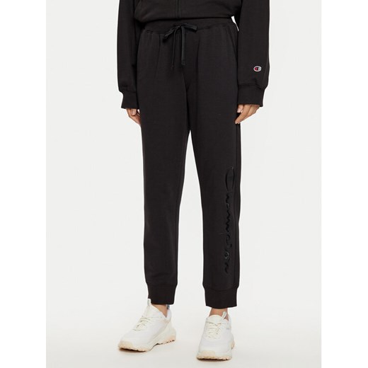 Champion Spodnie dresowe 117584 Czarny Slim Fit ze sklepu MODIVO w kategorii Spodnie damskie - zdjęcie 182751307