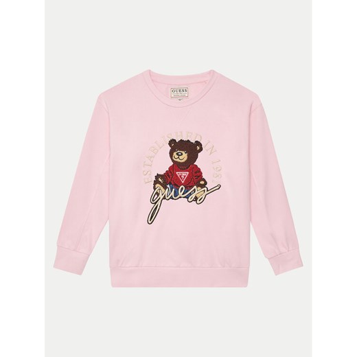 Guess Bluza H5RJ01 KAD74 Różowy Regular Fit ze sklepu MODIVO w kategorii Bluzy dziewczęce - zdjęcie 182753107