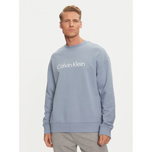 Calvin Klein Bluza Hero Logo K10K112956 Niebieski Comfort Fit ze sklepu MODIVO w kategorii Bluzy męskie - zdjęcie 182753256