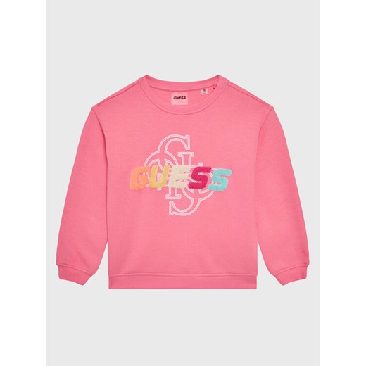 Guess Bluza J3GQ08 FL04P Różowy Regular Fit ze sklepu MODIVO w kategorii Bluzy dziewczęce - zdjęcie 182753848