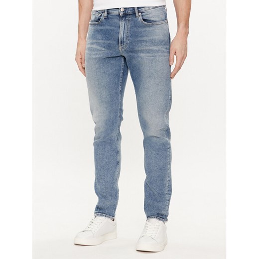 Calvin Klein Jeans Jeansy J30J324844 Niebieski Slim Fit ze sklepu MODIVO w kategorii Jeansy męskie - zdjęcie 182754685