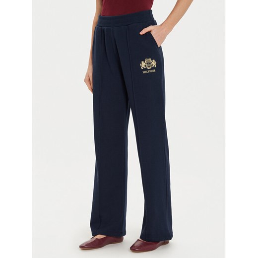 Tommy Hilfiger Spodnie dresowe Varsity WW0WW43862 Granatowy Regular Fit ze sklepu MODIVO w kategorii Spodnie damskie - zdjęcie 182755119