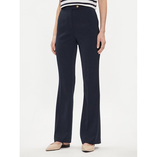 Tommy Hilfiger Spodnie materiałowe Gold Button WW0WW42455 Granatowy Flare Fit ze sklepu MODIVO w kategorii Spodnie damskie - zdjęcie 182755967