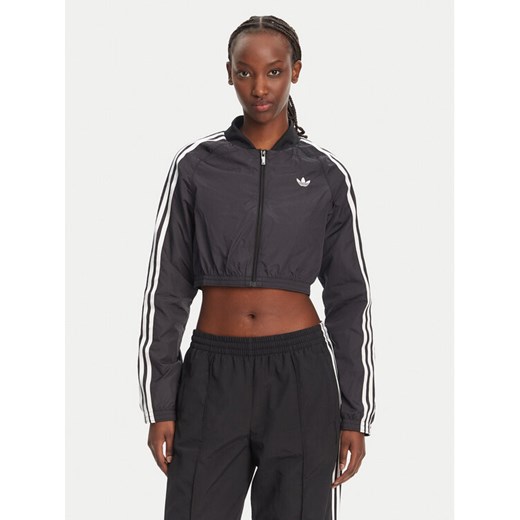 adidas Bluza adicolor Teamgeist JD0264 Czarny Slim Fit ze sklepu MODIVO w kategorii Bluzy damskie - zdjęcie 182756316