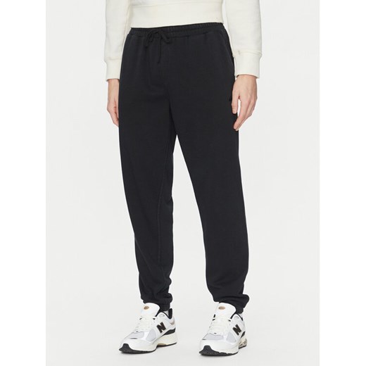 Quiksilver Spodnie dresowe Salt Water AQYFB03034 Czarny Regular Fit ze sklepu MODIVO w kategorii Spodnie męskie - zdjęcie 182758186