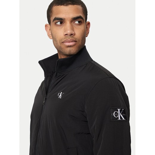 Calvin Klein Jeans Kurtka przejściowa Harrington J30J325592 Czarny Regular Fit ze sklepu MODIVO w kategorii Kurtki męskie - zdjęcie 182759968