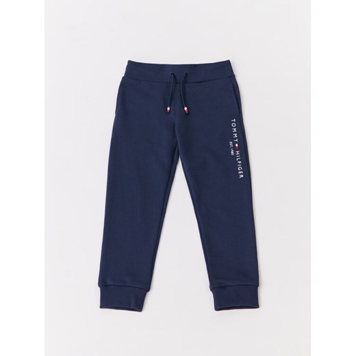 Tommy Hilfiger Spodnie dresowe Essential KS0KS00214C87 M Granatowy Regular Fit ze sklepu MODIVO w kategorii Spodnie chłopięce - zdjęcie 182760148