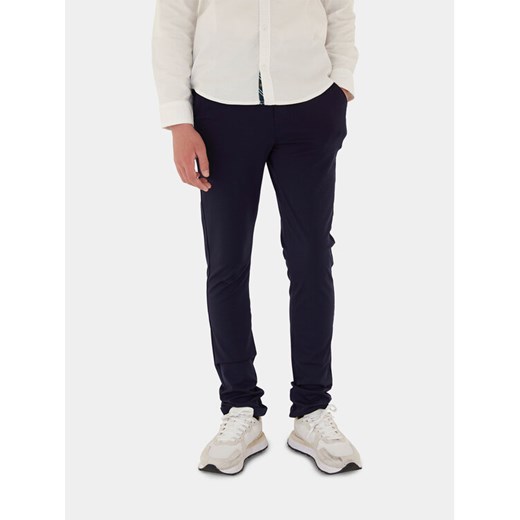Guess Spodnie materiałowe L4RB05 KC3G0 Granatowy Regular Fit ze sklepu MODIVO w kategorii Spodnie chłopięce - zdjęcie 182760628