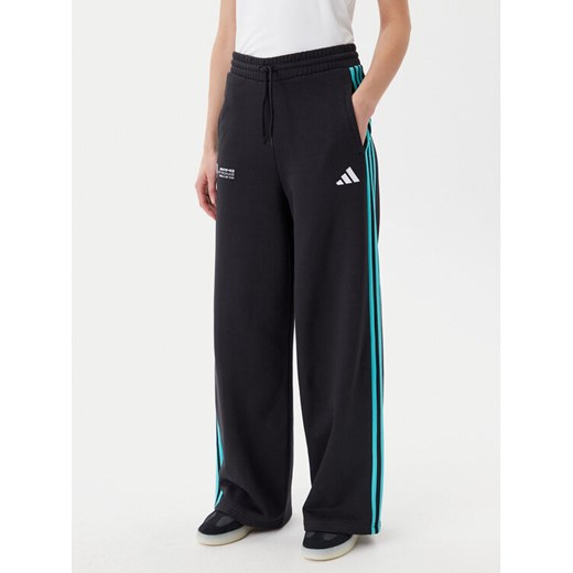 adidas Spodnie dresowe Mercedes - AMG Petronas Formula One Team DNA JV5432 Czarny Regular Fit ze sklepu MODIVO w kategorii Spodnie damskie - zdjęcie 182761259