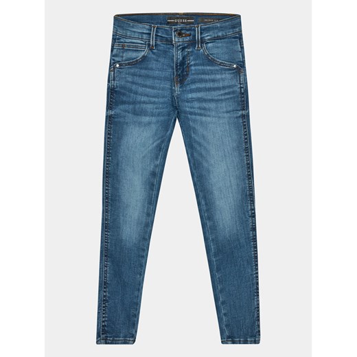 Guess Jeansy J3YA16 D4CA0 Niebieski Skinny Fit ze sklepu MODIVO w kategorii Spodnie chłopięce - zdjęcie 182761657