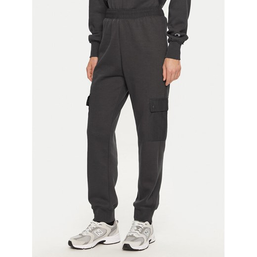 Champion Spodnie dresowe 117499 Szary Regular Fit ze sklepu MODIVO w kategorii Spodnie damskie - zdjęcie 182761775