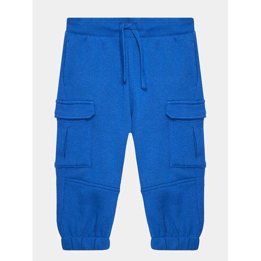 United Colors Of Benetton Spodnie dresowe 3J68GF034 Niebieski Regular Fit ze sklepu MODIVO w kategorii Spodnie chłopięce - zdjęcie 182761975