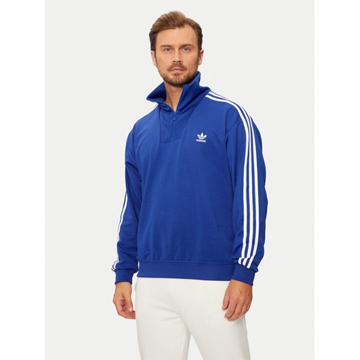 adidas Bluza adicolor Funnel IX5216 Niebieski Regular Fit ze sklepu MODIVO w kategorii Bluzy męskie - zdjęcie 182762489