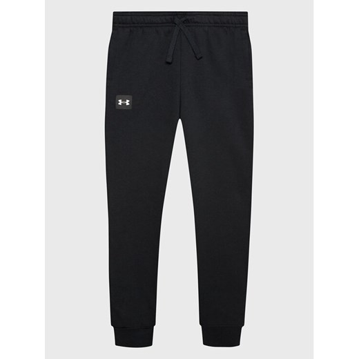 Under Armour Spodnie dresowe Ua Rival 1357628 Czarny Regular Fit ze sklepu MODIVO w kategorii Spodnie chłopięce - zdjęcie 182762515