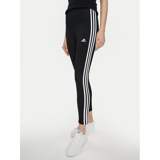 adidas Legginsy Essentials 3-Stripes High-Waisted Single Jersey Leggings IC7151 Czarny ze sklepu MODIVO w kategorii Spodnie damskie - zdjęcie 182763138