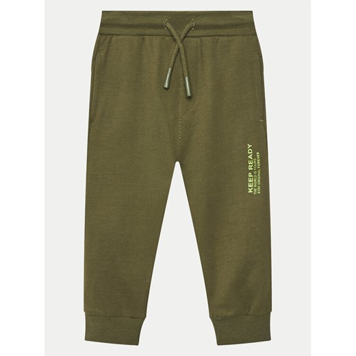 Coccodrillo Spodnie dresowe WC5120101VBA Zielony Regular Fit ze sklepu MODIVO w kategorii Spodnie chłopięce - zdjęcie 182763208