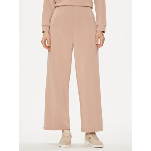 United Colors Of Benetton Spodnie dzianinowe 3UNN3F03B Beżowy Relaxed Fit ze sklepu MODIVO w kategorii Spodnie damskie - zdjęcie 182765266