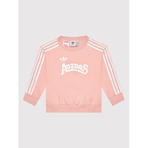 adidas Bluza Graphic HC4559 Różowy Loose Fit ze sklepu MODIVO w kategorii Bluzy dziewczęce - zdjęcie 182765879