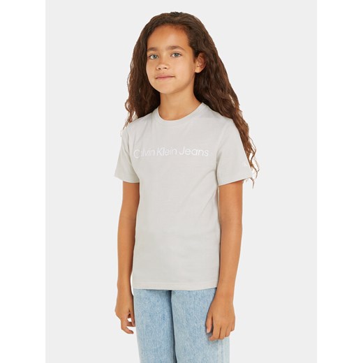 Calvin Klein Jeans T-Shirt IU0IU00599 Szary Regular Fit ze sklepu MODIVO w kategorii Bluzki dziewczęce - zdjęcie 182766368