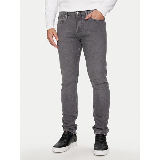 Calvin Klein Jeans Jeansy J30J325730 Szary Slim Fit ze sklepu MODIVO w kategorii Jeansy męskie - zdjęcie 182766515