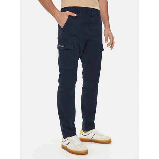 Tommy Jeans Spodnie materiałowe Austin DM0DM19489 Granatowy Regular Fit ze sklepu MODIVO w kategorii Spodnie męskie - zdjęcie 182766659