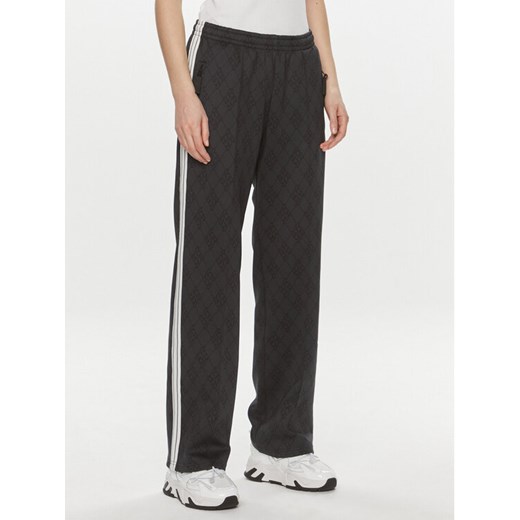 Replay Spodnie dresowe W8115.000.74934 Czarny Regular Fit ze sklepu MODIVO w kategorii Spodnie damskie - zdjęcie 182767298