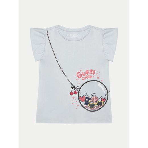Guess T-Shirt K5GI05 K6YW4 Błękitny Regular Fit ze sklepu MODIVO w kategorii Bluzki dziewczęce - zdjęcie 182767857