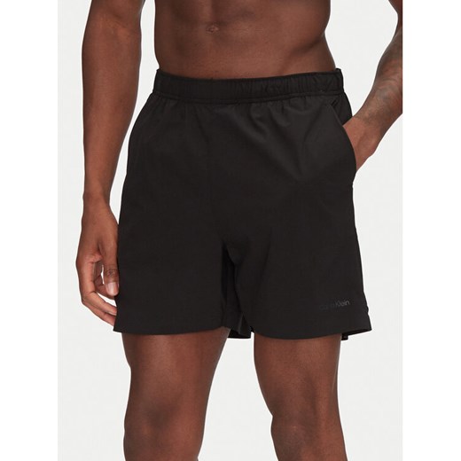 Calvin Klein Swimwear Szorty kąpielowe KM0KM01118 Czarny Regular Fit ze sklepu MODIVO w kategorii Kąpielówki - zdjęcie 182767867