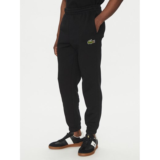 Lacoste Spodnie dresowe XH2750 Czarny Regular Fit ze sklepu MODIVO w kategorii Spodnie męskie - zdjęcie 183558589