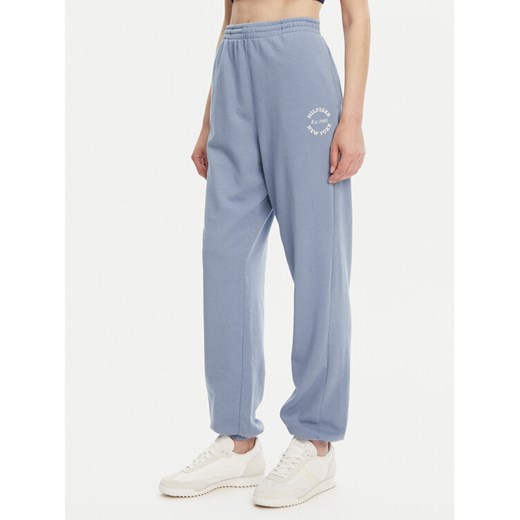 Tommy Hilfiger Spodnie dresowe UW0UW05793 Niebieski Regular Fit ze sklepu MODIVO w kategorii Spodnie damskie - zdjęcie 183591369