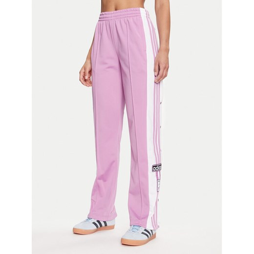 adidas Spodnie dresowe Adibreak IY2129 Fioletowy Loose Fit ze sklepu MODIVO w kategorii Spodnie damskie - zdjęcie 183593355