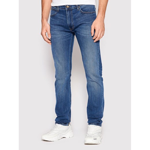 Lee Jeansy Luke L719AKIG 112318933 Niebieski Slim Tapered Fit ze sklepu MODIVO w kategorii Jeansy męskie - zdjęcie 183612665