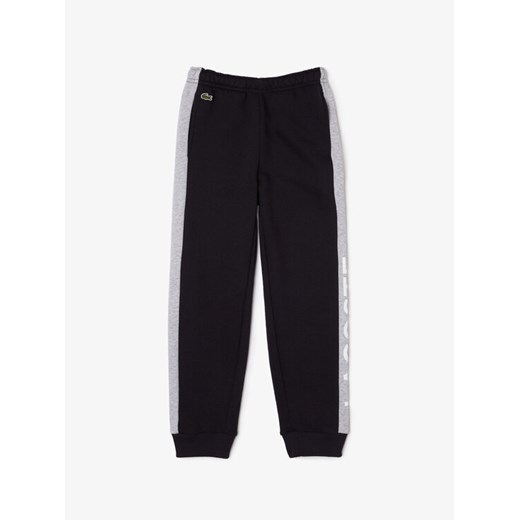 Lacoste Spodnie dresowe XJ5327 Czarny Regular Fit ze sklepu MODIVO w kategorii Spodnie chłopięce - zdjęcie 183639478