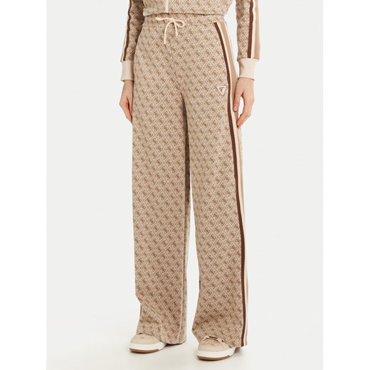 Guess Spodnie dresowe V5RB03 KCO90 Beżowy Regular Fit ze sklepu MODIVO w kategorii Spodnie damskie - zdjęcie 183660119