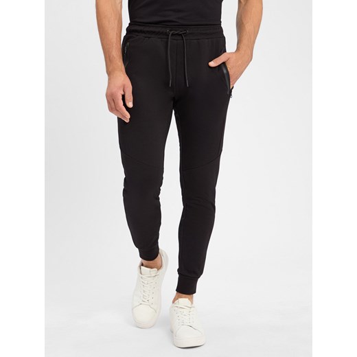 Jack & Jones Męskie spodnie do biegania - JPSTWill Mężczyźni Sztuczne włókno czarny jednolity ze sklepu vangraaf w kategorii Spodnie męskie - zdjęcie 183661598