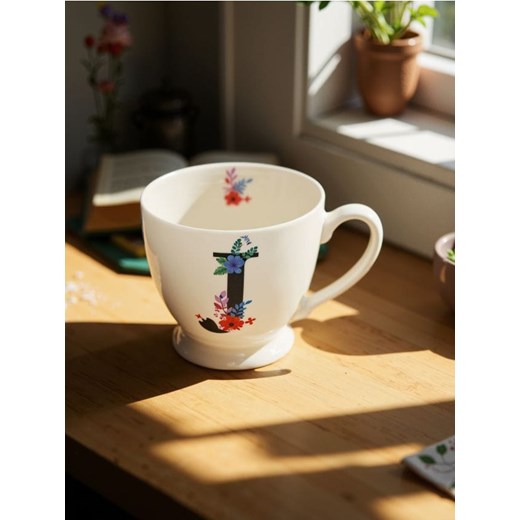 Sinsay - Porcelanowy kubek z inicjałem i kwiatowym motywem - czarny ze sklepu Sinsay w kategorii Kubki - zdjęcie 183663575