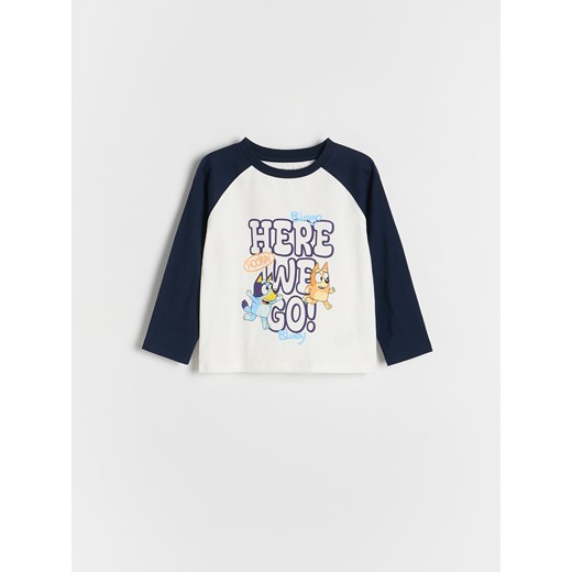 Reserved - Bawełniany longsleeve Bluey - złamana biel ze sklepu Reserved w kategorii T-shirty chłopięce - zdjęcie 183667529