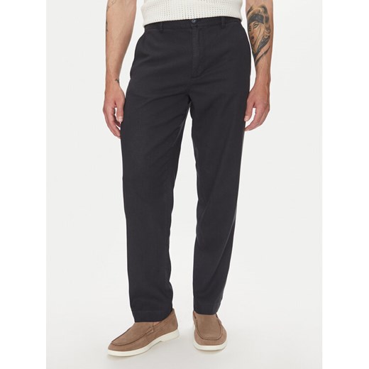Lindbergh Spodnie materiałowe 30-008031 Granatowy Relaxed Fit ze sklepu MODIVO w kategorii Spodnie męskie - zdjęcie 183679067
