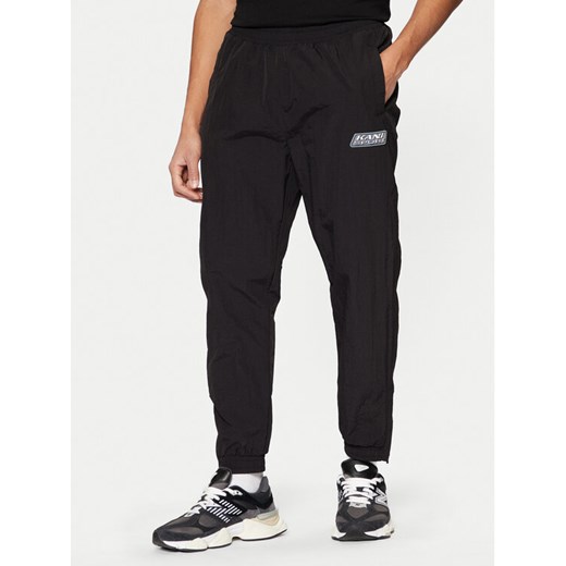 Karl Kani Spodnie dresowe Sport Patch Essential 60030077 Czarny Relaxed Fit ze sklepu MODIVO w kategorii Spodnie męskie - zdjęcie 183689375