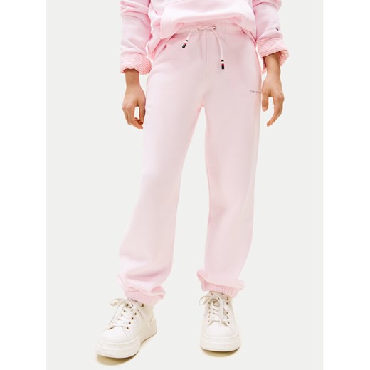 Tommy Hilfiger Spodnie dresowe KS0KS00596 Różowy Regular Fit ze sklepu MODIVO w kategorii Spodnie dziewczęce - zdjęcie 183706268