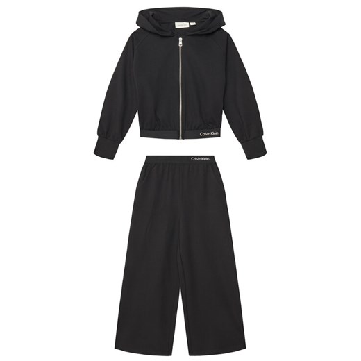 Calvin Klein Jeans Dres Logo Tape IG0IG02817 D Czarny Regular Fit ze sklepu MODIVO w kategorii Dresy chłopięce - zdjęcie 183706669