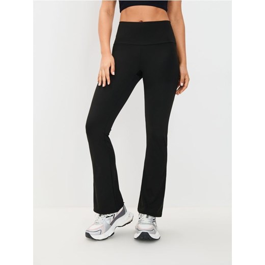Sinsay - Legginsy flare GYM HARD - czarny ze sklepu Sinsay w kategorii Spodnie damskie - zdjęcie 183720969