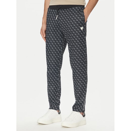 Guess Spodnie dresowe Korbin Z2BB05 FL04Q Czarny Regular Fit ze sklepu MODIVO w kategorii Spodnie męskie - zdjęcie 183765076