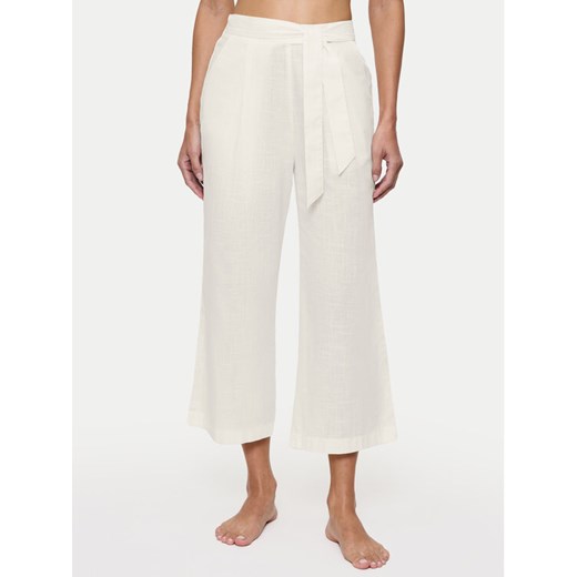Triumph Spodnie materiałowe Summer 10222571 Écru Relaxed Fit ze sklepu MODIVO w kategorii Spodnie damskie - zdjęcie 183765245