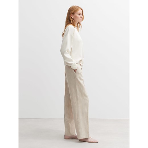 OPUS Spodnie w kolorze beżowym Opus 38 okazja Limango Polska