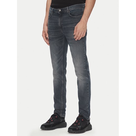 HUGO Jeansy 50542675 Szary Extra Slim Fit ze sklepu MODIVO w kategorii Jeansy męskie - zdjęcie 183814938