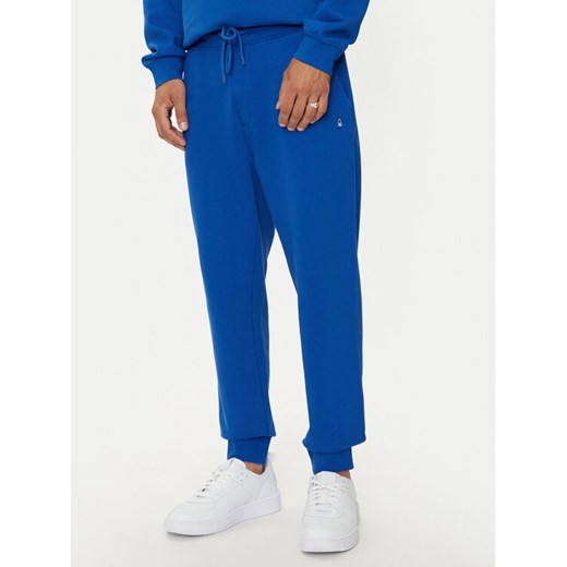 United Colors Of Benetton Spodnie dresowe 342ZUF01B Niebieski Regular Fit ze sklepu MODIVO w kategorii Spodnie męskie - zdjęcie 183851768