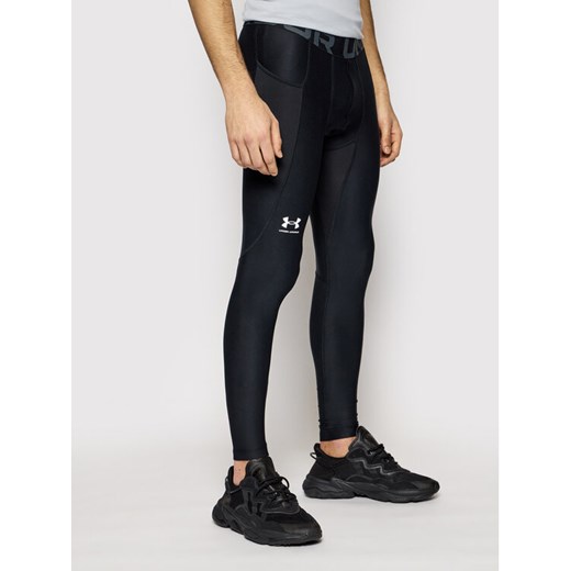 Under Armour Legginsy HeatGear® 1361586 Czarny Slim Fit ze sklepu MODIVO w kategorii Spodnie męskie - zdjęcie 183867395