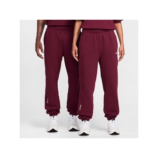 Spodnie dresowe NOCTA Fleece CS - Czerwony ze sklepu Nike poland w kategorii Spodnie męskie - zdjęcie 183881536