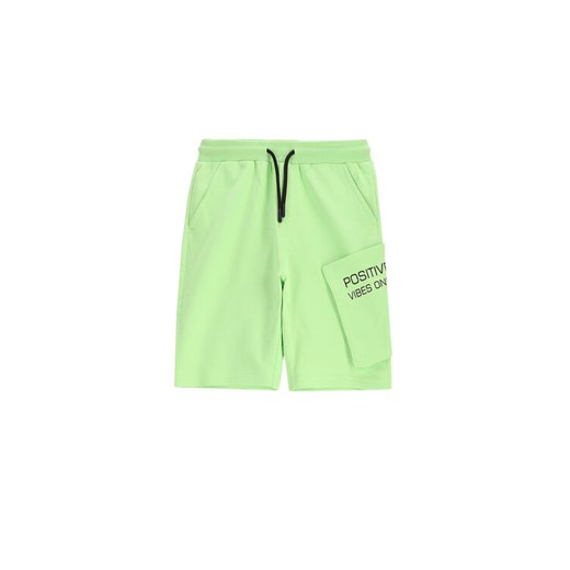 Coccodrillo Szorty sportowe WC5120501VBC Zielony Regular Fit ze sklepu MODIVO w kategorii Spodenki chłopięce - zdjęcie 183928675